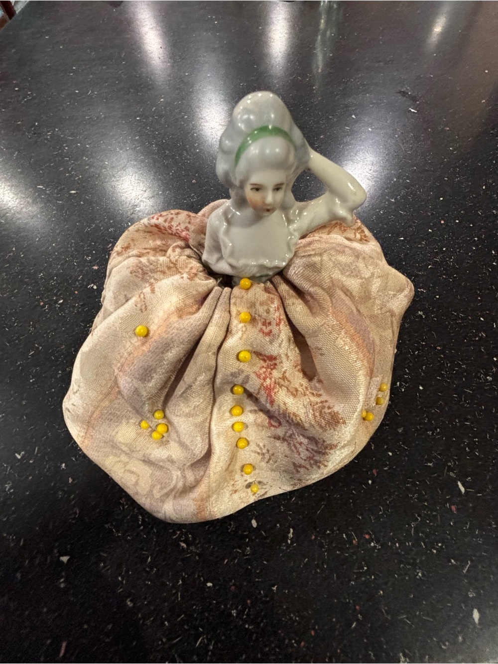 Porcelain Half-Doll Pin Cushion with Beige Fabric Skirt 
Stands 6” high